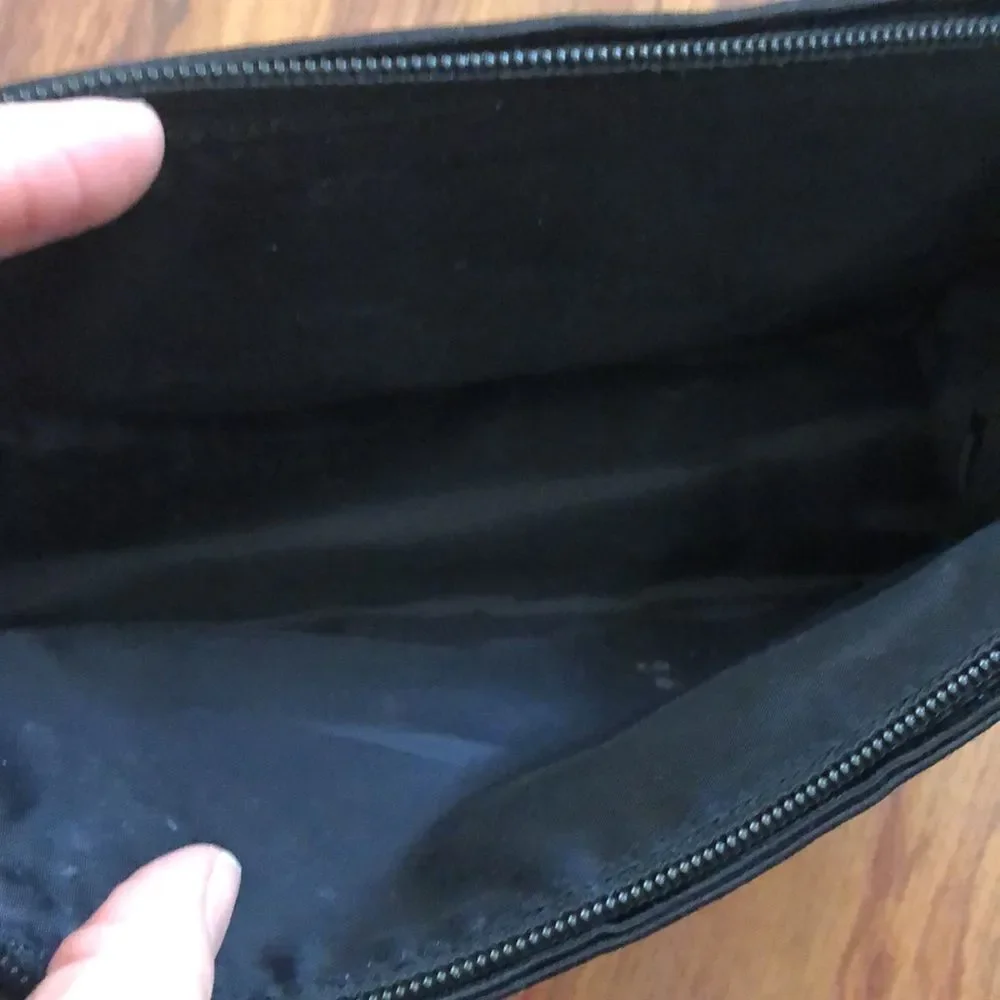 MAC Cosmetics black and purple bag.